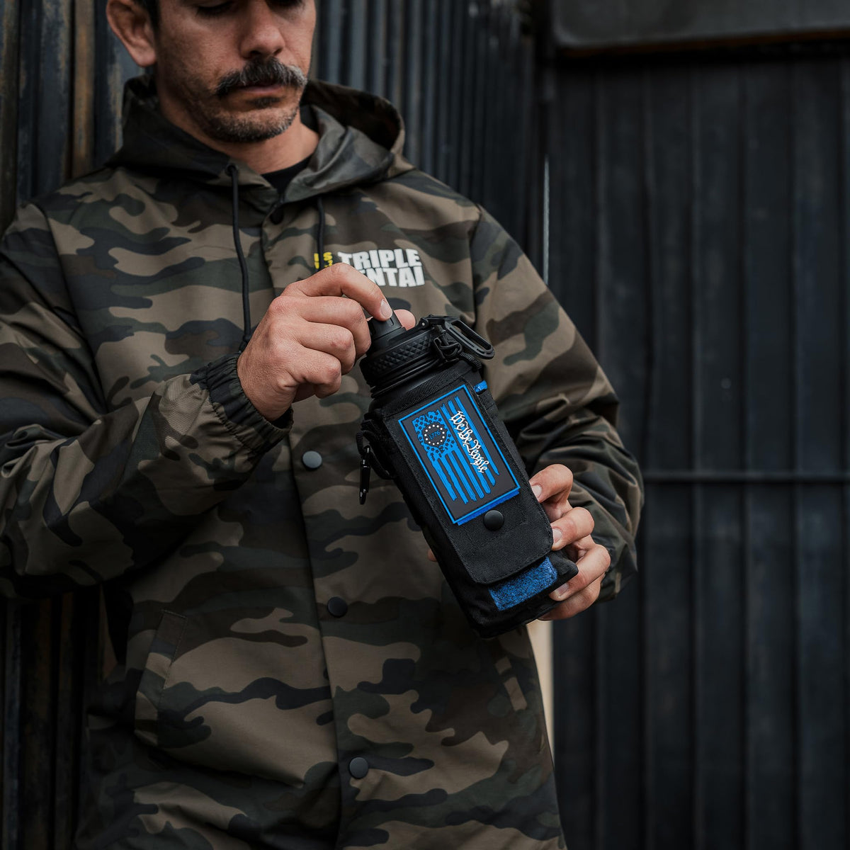 Iron Infidel Battle Bottle - Half Gallon Insulated Water Bottle with Paracord Handle, Large 64 oz Stainless Steel Water Jug with Rugged, Removable Sleeve for Keys, Wallet, & Phone (Live Free 2 Liter)